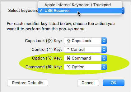 System Preferences / Keyboard / Modifier Keys - with USB Receiver clicked and Option swapped for command, and Command swapped for Option